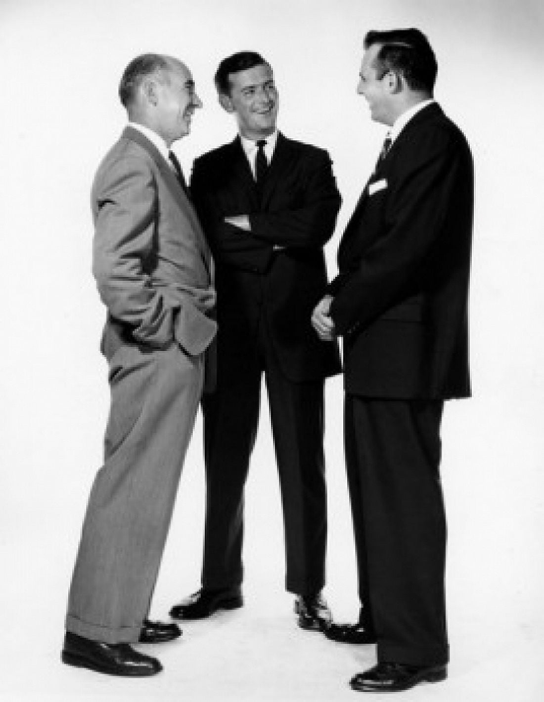 Three businessmen talking to each other Canvas Art - (18 x 24)
