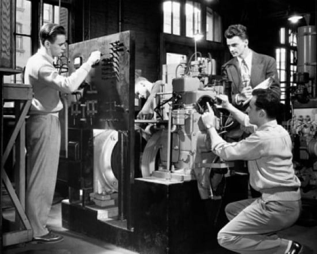 Three college students making a model in a laboratory Canvas Art - (24 x 36)