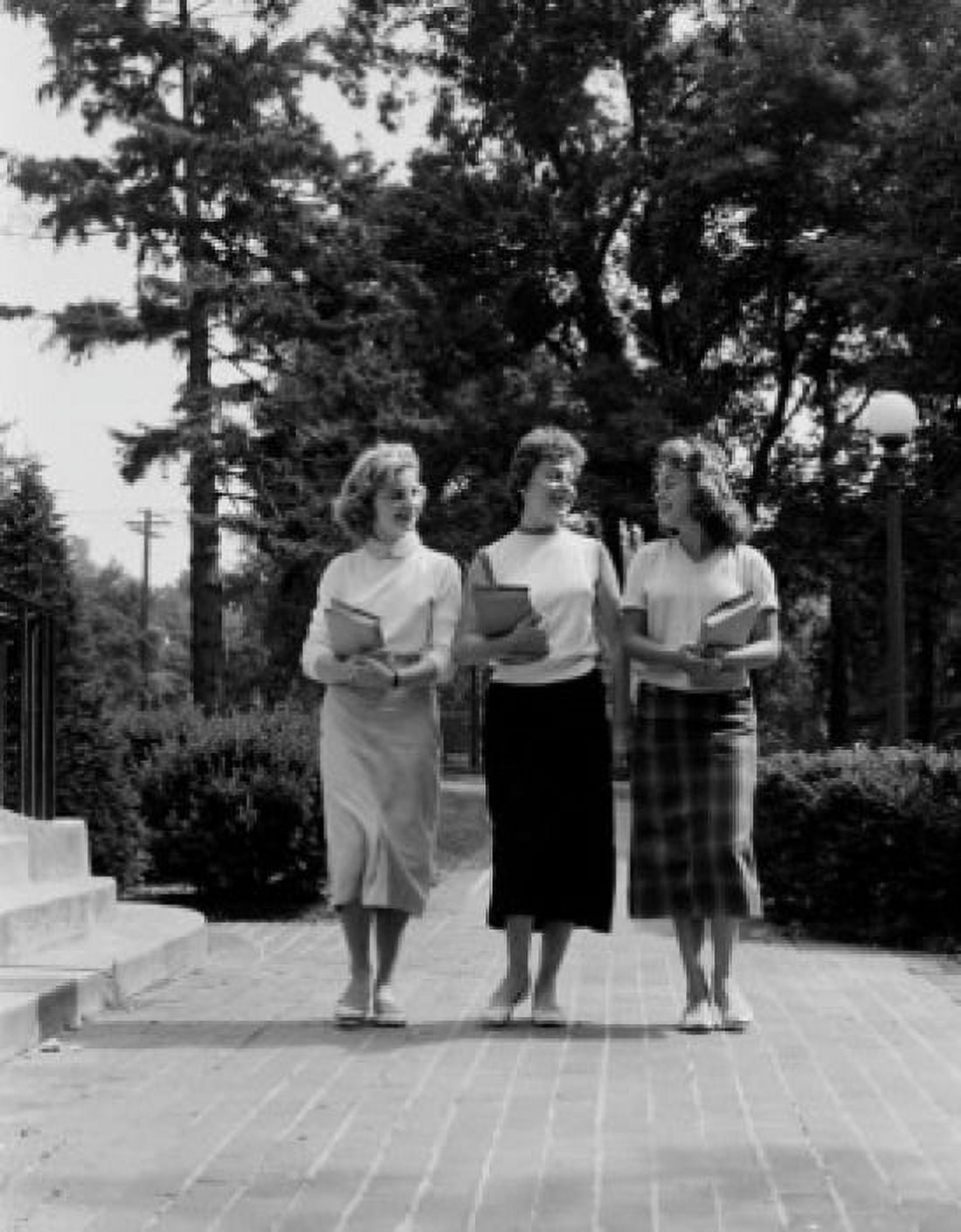 Three female students walking and laughing Canvas Art -  (18 x 24)