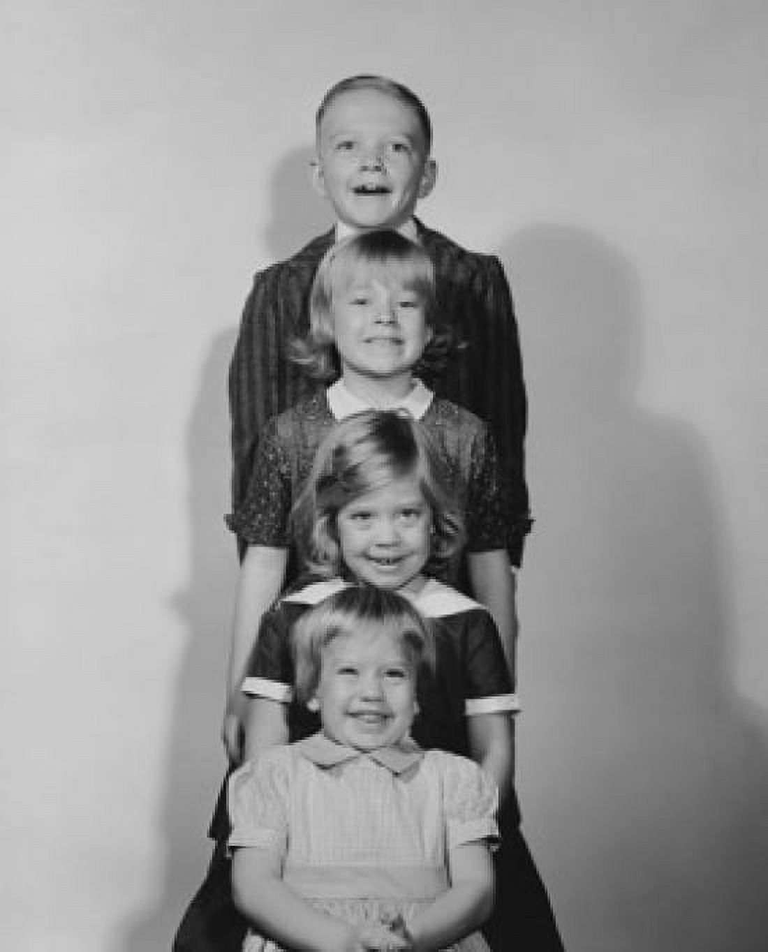 Three girls and a boy standing in a row Canvas Art - (18 x 24)
