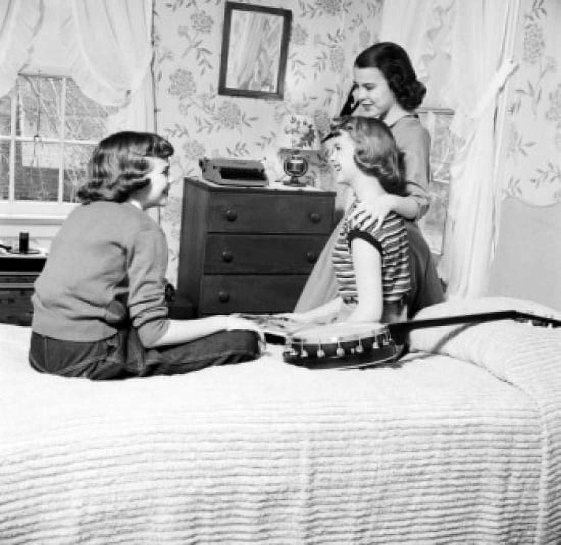Three girls sitting on bed and talking Canvas Art - (18 x 24)