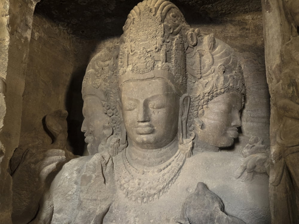 Three headed sculpture of Maheshmurti Shiva at Elephanta Caves Elephanta Island Mumbai Harbour Mumbai Maharashtra India Canvas Art - Panoramic Images (12 x 16)