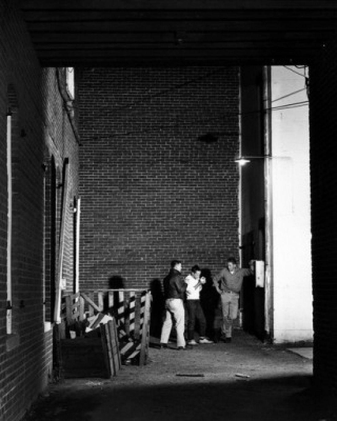 Three men smoking cigarettes in alley Canvas Art -  (18 x 24)