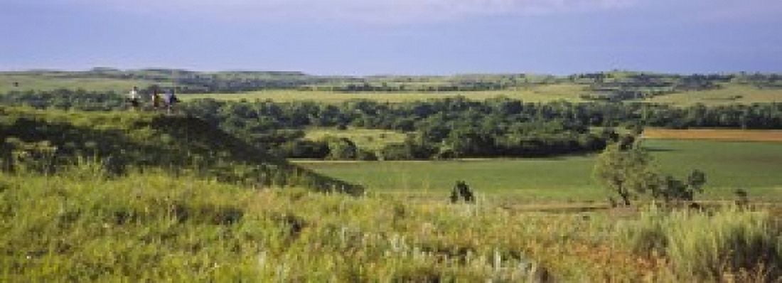Three mountain bikers on a hill Kansas USA Canvas Art - Panoramic Images (18 x 7)