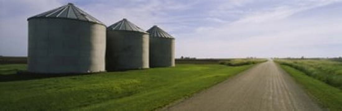 Three silos in a field Canvas Art - Panoramic Images (18 x 6)