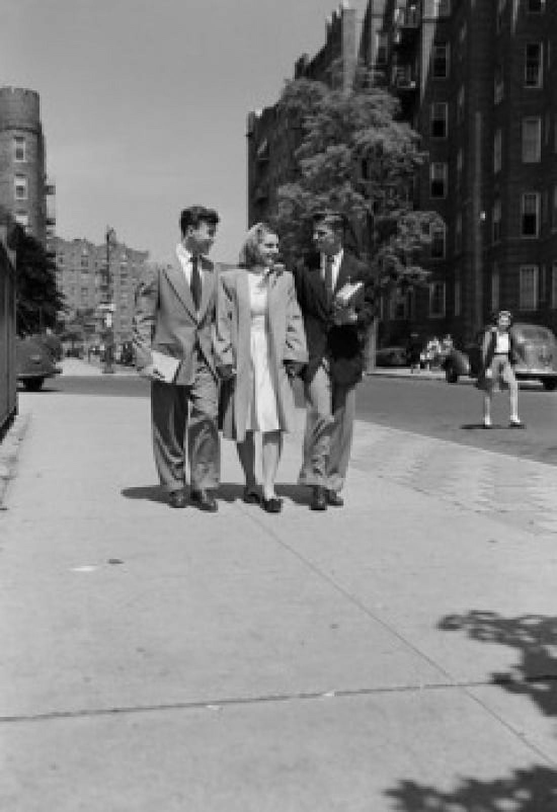 Three students walking side by side in street Canvas Art - (18 x 24)