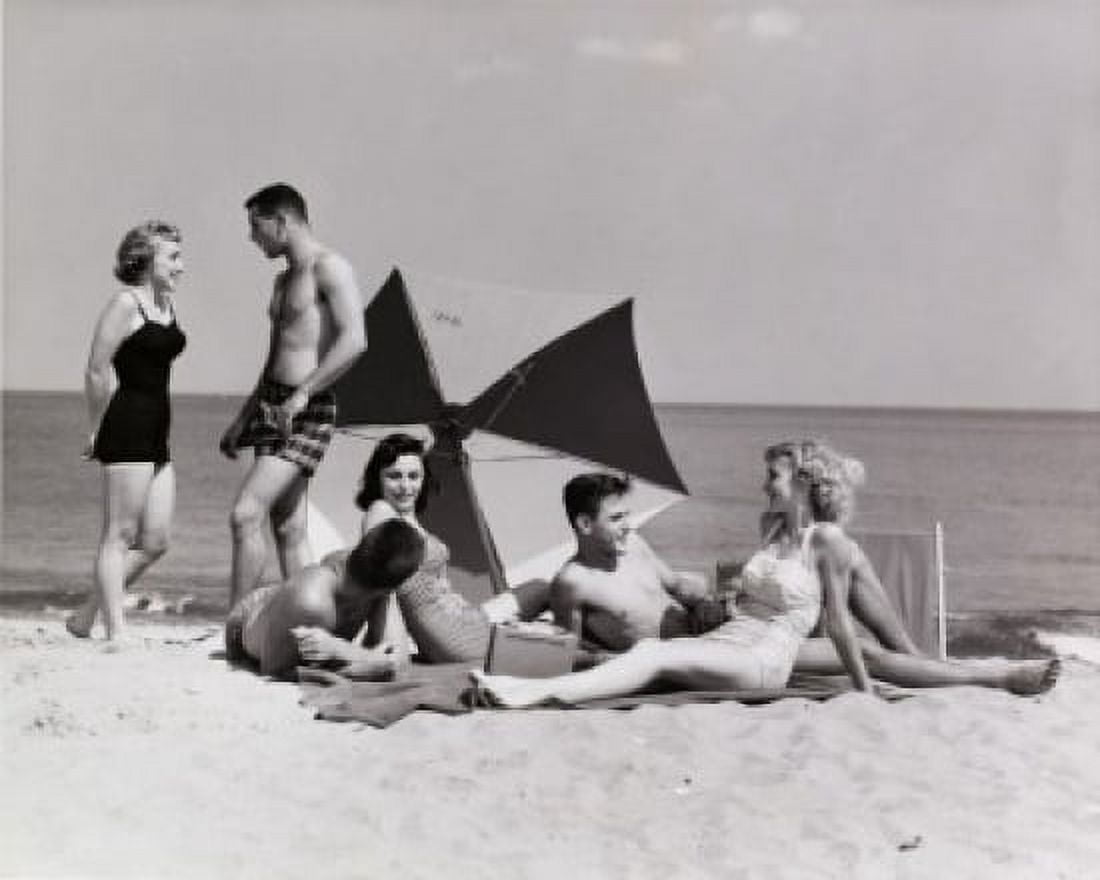 Three teenage couples on the beach Canvas Art - (24 x 36)