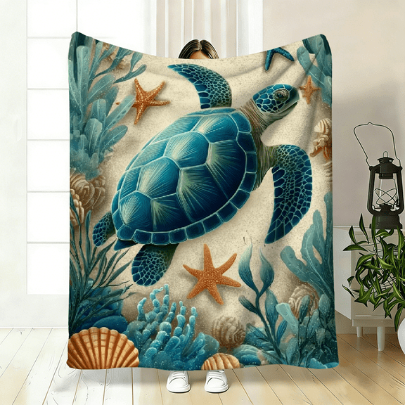 This Throw Blanket Features a Ocean Theme with Designs of Swimming Turtles, Fish, And Coral Reefs. It Is Soft, Cozy, And Machine Washable, Making It Ideal for Use on a Bed.