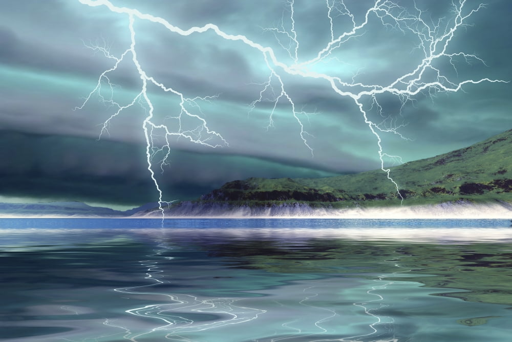 Thunderclouds and lightning move over the mountains and a nearby lake Canvas Art - Corey FordStocktrek Images (18 x 12)