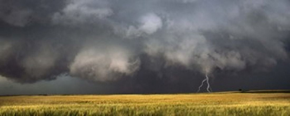 Thunderstorm advancing over a field Canvas Art - Panoramic Images (15 x 6)