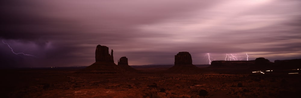 Thunderstorm over a landscape Monument Valley San Juan County Utah USA Canvas Art - Panoramic Images (36 x 12)