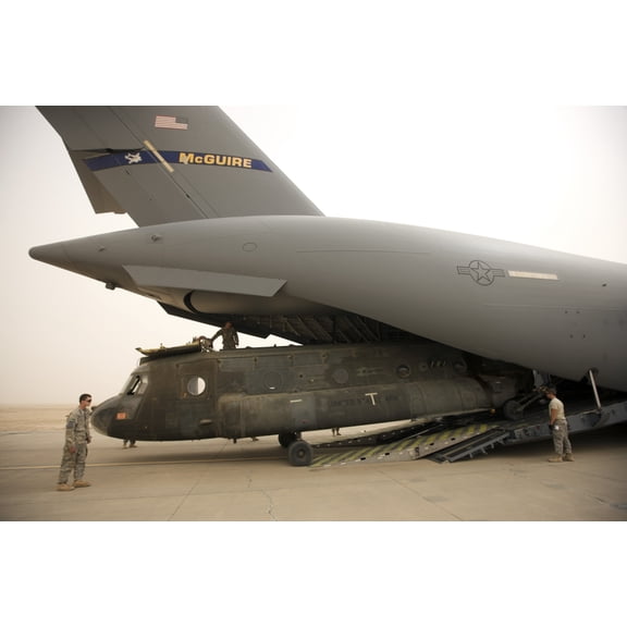 Tikrit Iraq - A CH-47 Chinook being loaded onto a C-17 Globemaster III Canvas Art - Terry MooreStocktrek Images (18 x 12)