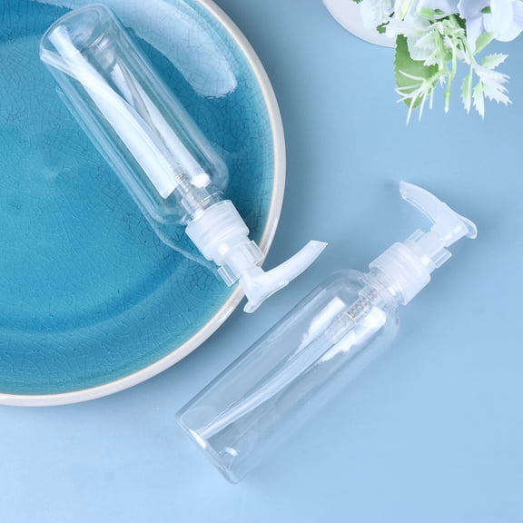 Tineasur 4Pcs Plastic Shampoo Bottle with Pump Transparent Reusable Dispenser for Home and Travel