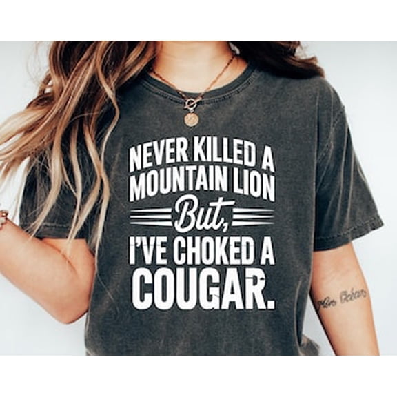 Tiny Nest Never Killed A Moutain Lion But I Have Choked A Cougar, Unisex Heavy Cotton Tee, T-Shirt, Choked A Cougar Shirt Shirt For Boy, Girl, Gift For Friend
