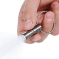 thumbnail image 1 of Titanium Keychain Flashlight, Key Unity 15 Lumens Waterproof Pocket Light with Key Ring for EDC, 1 of 7