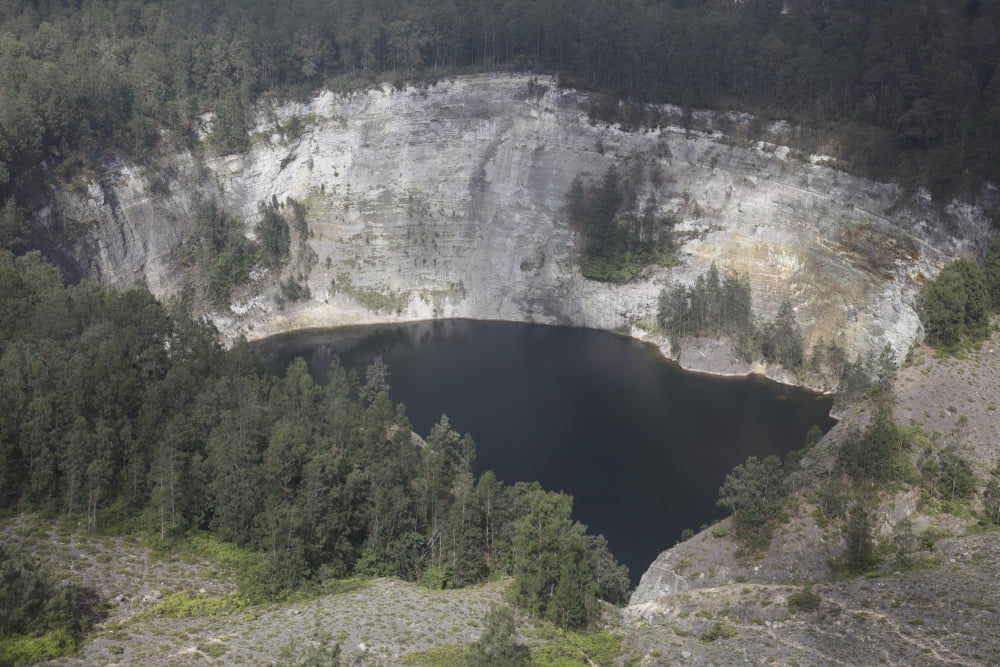 Tiwu Ata Mbupu crater lake of Kelimutu volcano Flores Island Indonesia Canvas Art - Richard RoscoeStocktrek Images (35 x 23)