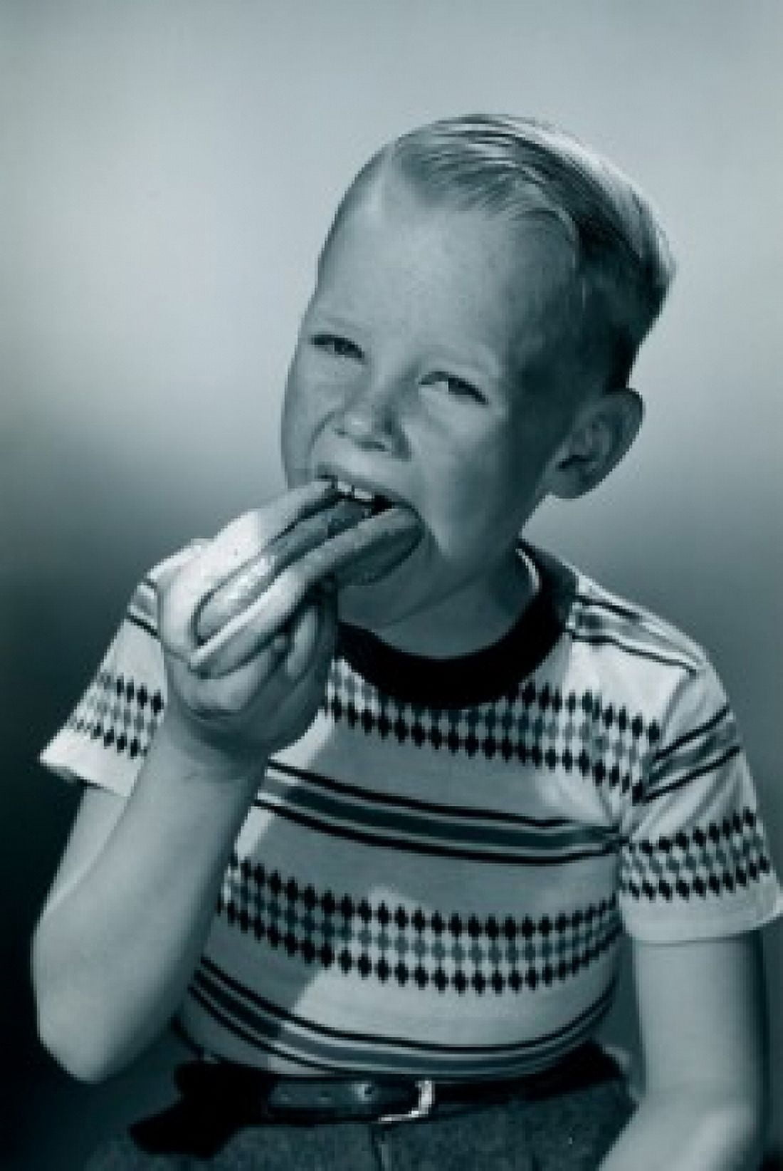 Toddler eating hot dog Canvas Art - (18 x 24)