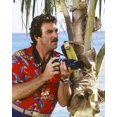 thumbnail image 1 of Tom Selleck in classic red Hawaiian shirt with camera by palm Magnum poster, 1 of 1