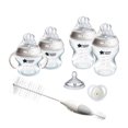 thumbnail image 1 of Tommee Tippee Natural Start Baby’s First Newborn Bottle Set, 2x 5oz and 2x 9oz Self-Sterilizing Baby Bottles, Slow & Medium Flow Nipples with Anti-Colic Valves, 0-6 Month Pacifier, 1 of 13