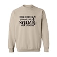thumbnail image 1 of Torn Between Looking Like A Snack Crewneck Sweatshirt, 1 of 3