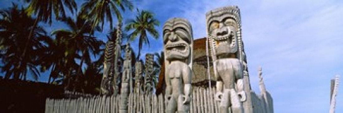Totem poles Puuhonua O Honaunau National Historical Park Hawaii USA Canvas Art - Panoramic Images (36 x 12)
