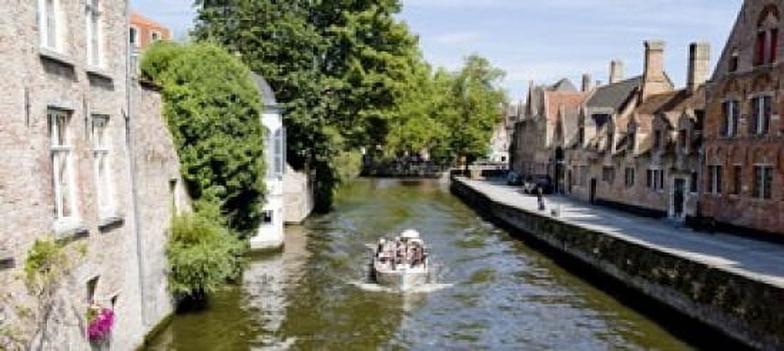 Tourboat in a canal Bruges West Flanders Belgium Canvas Art - Panoramic Images (15 x 7)