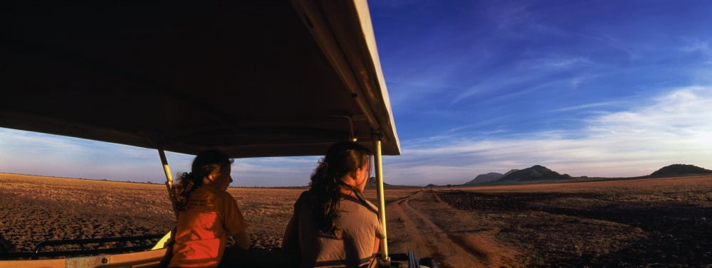 Tourist in Tsavo East National Park Kenya Canvas Art - Panoramic Images (27 x 9)