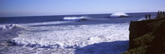 Tourist looking at waves in the sea Santa Cruz Santa Cruz County California USA Canvas Art - Panoramic Images (36 x 12)