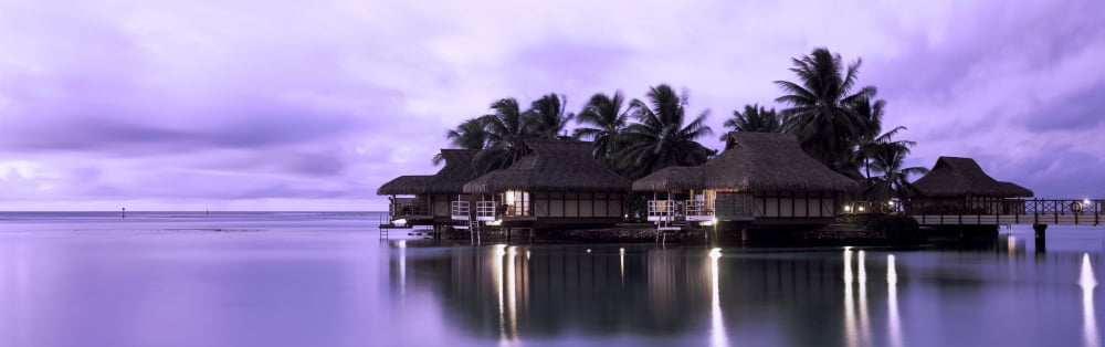 Tourist resort at dusk Tahiti French Polynesia Canvas Art - Panoramic Images (27 x 9)