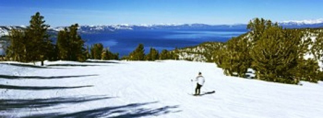 Tourist skiing in a ski resort Heavenly Mountain Resort Lake Tahoe California-Nevada Border USA Canvas Art - Panoramic Images (18 x 7)