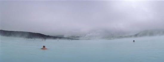 Tourist swimming in a thermal pool Blue Lagoon Reykjanes Peninsula Reykjavik Iceland Canvas Art - Panoramic Images (30 x 12)