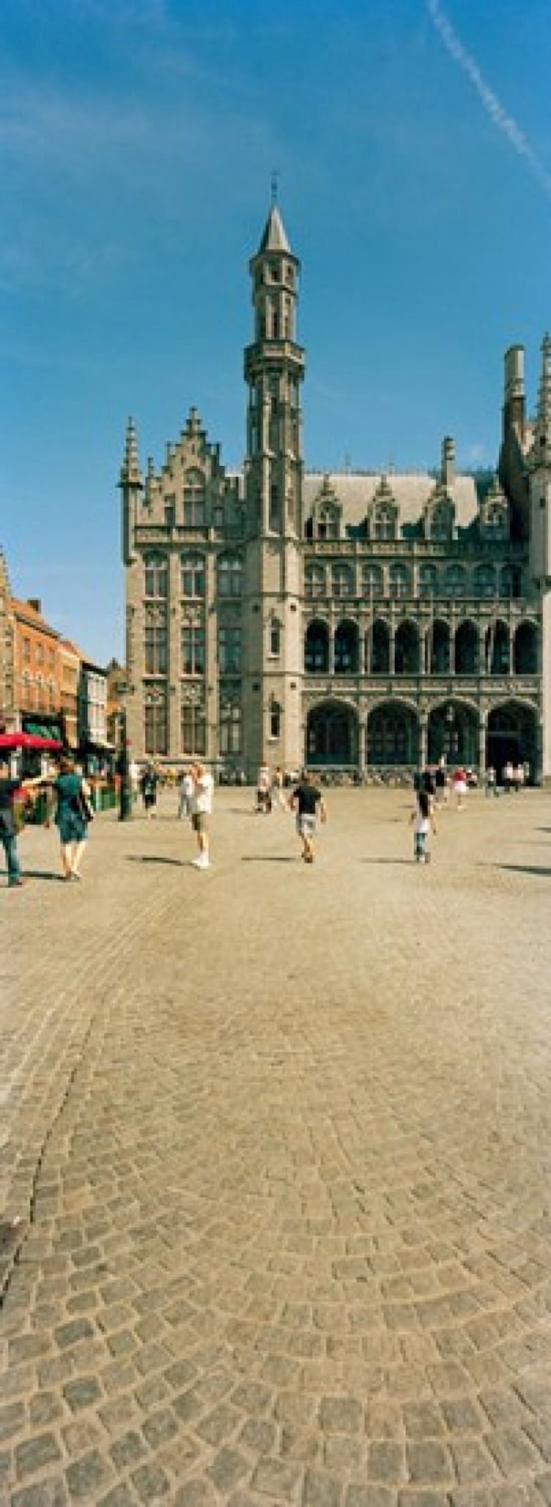 Tourists at a market Bruges West Flanders Flemish Region Belgium Canvas Art - Panoramic Images (18 x 7)