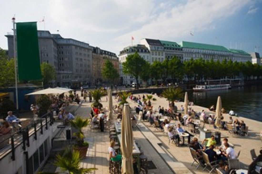Tourists at a sidewalk cafe Binnenalster Lake Hamburg Germany Canvas Art - Panoramic Images (36 x 24)