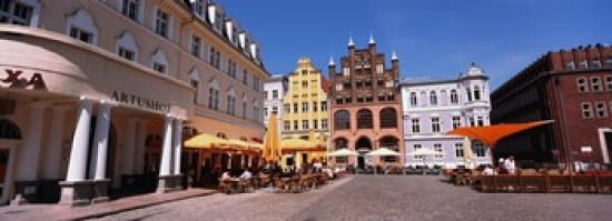 Tourists at a sidewalk cafe Stralsund Mecklenburg-Vorpommern Germany Canvas Art - Panoramic Images (36 x 13)