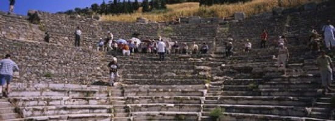 Tourists at old ruins of an amphitheater Odeon Ephesus Turkey Canvas Art - Panoramic Images (18 x 7)