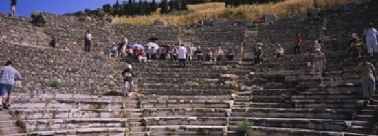 Tourists at old ruins of an amphitheater Odeon Ephesus Turkey Canvas Art - Panoramic Images (36 x 13)