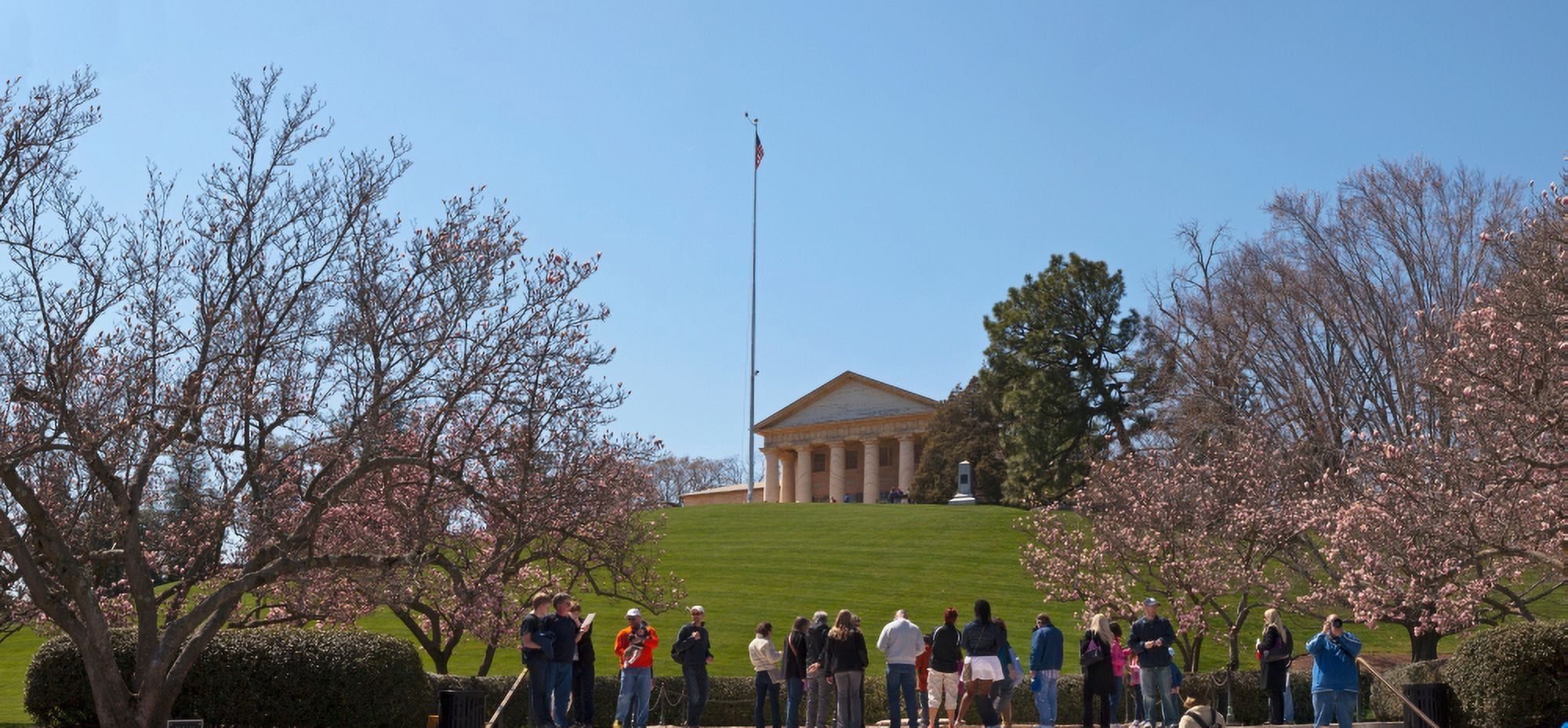 Tourists at the gravesite of John F Kennedy Arlington House Arlington National Cemetery Arlington Virginia USA Canvas Art - Panoramic Images (9 x 27)
