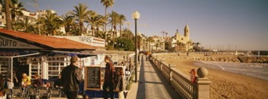 Tourists in a cafe Tapas Cafe Sitges Beach Catalonia Spain Canvas Art - Panoramic Images (30 x 12)