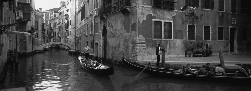 Tourists in a gondola Venice Italy Canvas Art - Panoramic Images (13 x 36)
