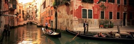 Tourists in a gondola Venice Italy Canvas Art - Panoramic Images (36 x 13)