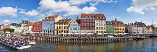 Tourists in a tourboat with buildings along a canal Nyhavn Copenhagen Denmark Canvas Art - Panoramic Images (36 x 12)