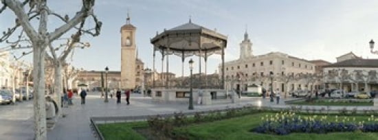 Tourists in front of buildings Plaza De Cervantes Alcala De Henares Madrid Spain Canvas Art - Panoramic Images (36 x 13)