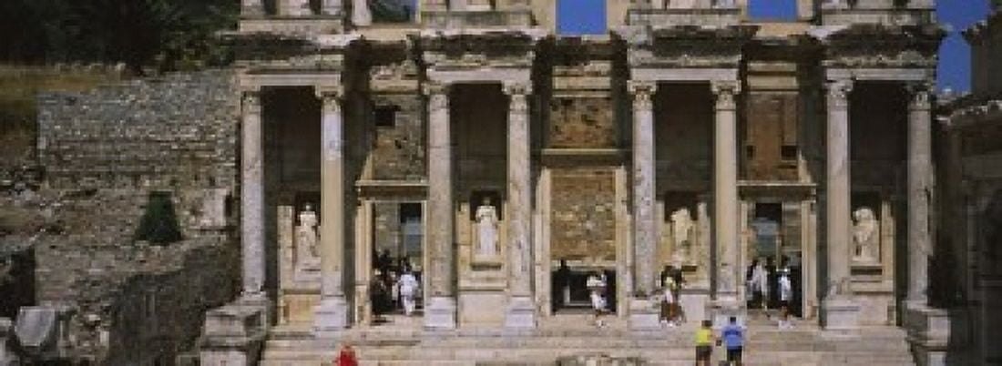 Tourists in front of the old ruins of a library Library At Epheses Ephesus Turkey Canvas Art - Panoramic Images (18 x 7)