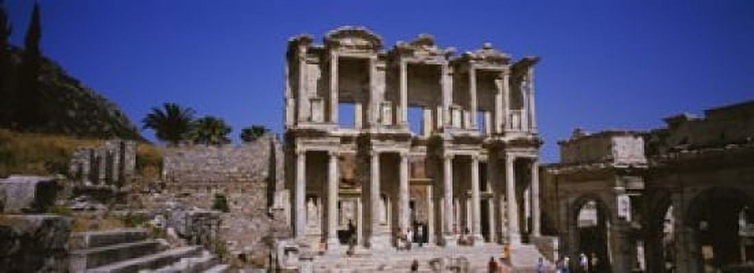 Tourists in front of the old ruins of a library Library At Epheses Ephesus Turkey Canvas Art - Panoramic Images (18 x 7)