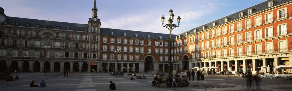Tourists in the courtyard of a building Plaza Mayor Madrid Spain Canvas Art - Panoramic Images (12 x 36)