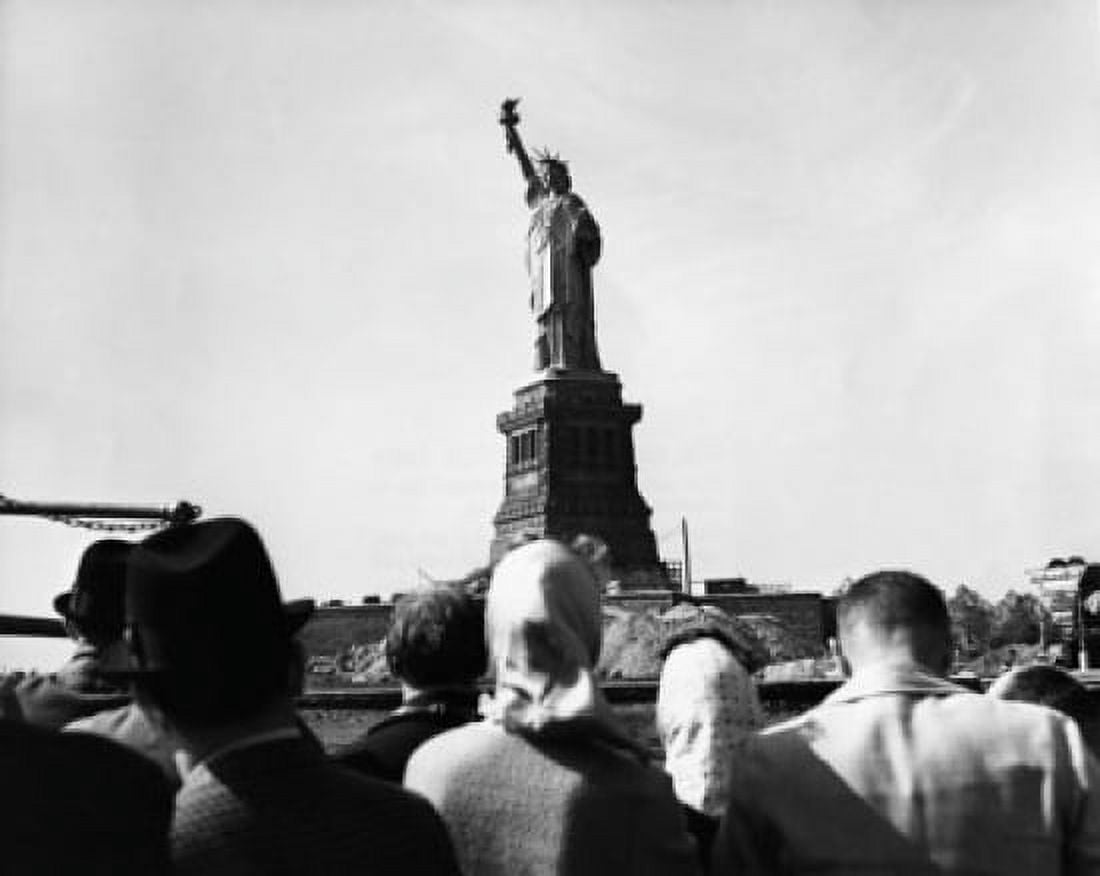Tourists looking at a statue Statue of Liberty New York City New York USA Canvas Art - (18 x 24)