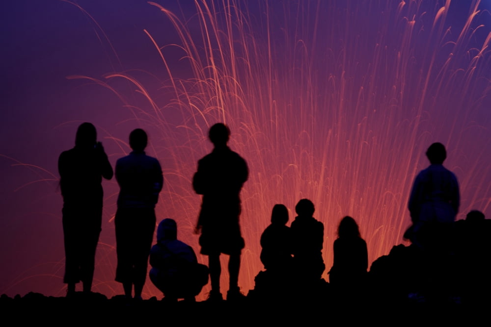 Tourists observing the Strombolian eruption of Yasur Volcano Tanna Island Vanuatu Canvas Art - Richard RoscoeStocktrek Images (35 x 24)