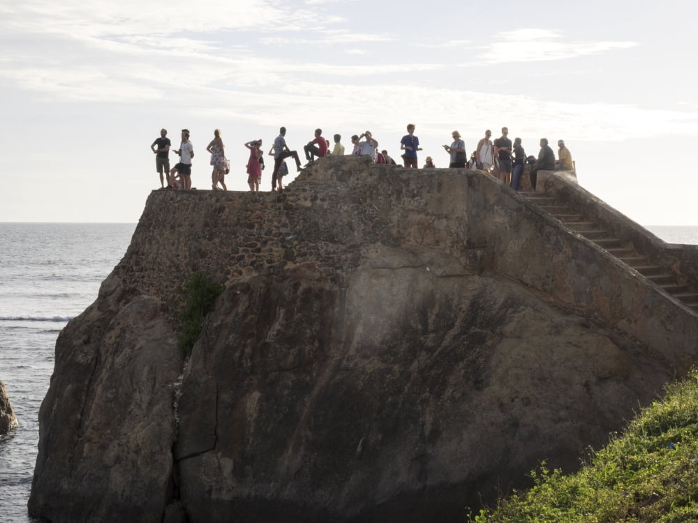 Tourists on Flag Rock Bastion part of wall surrounding Galle Fort Rampart Street Southern Province Sri Lanka Canvas Art - Panoramic Images (12 x 16)