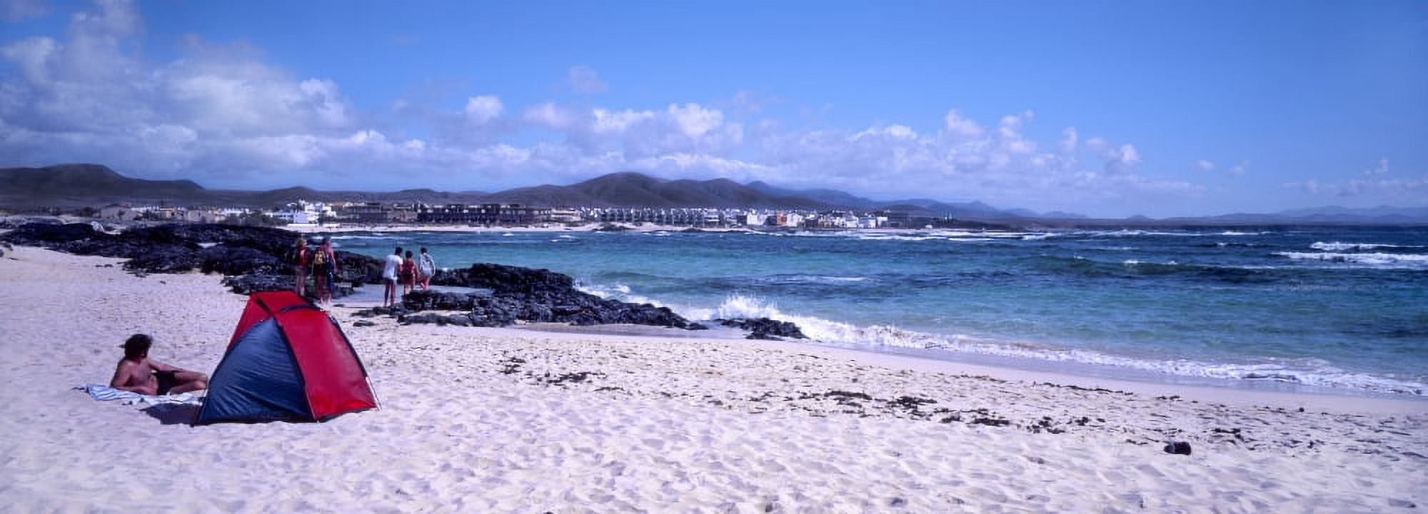 Tourists on beach of West Shore El Cotillo Fuerteventura Canary Islands Spain Canvas Art - Panoramic Images (27 x 9)