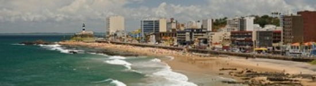 Tourists on the Porto Da Barra Beach with Farol Da Barra Lighthouse in background Salvador Bahia Brazil Canvas Art - Panoramic Images (21 x 6)